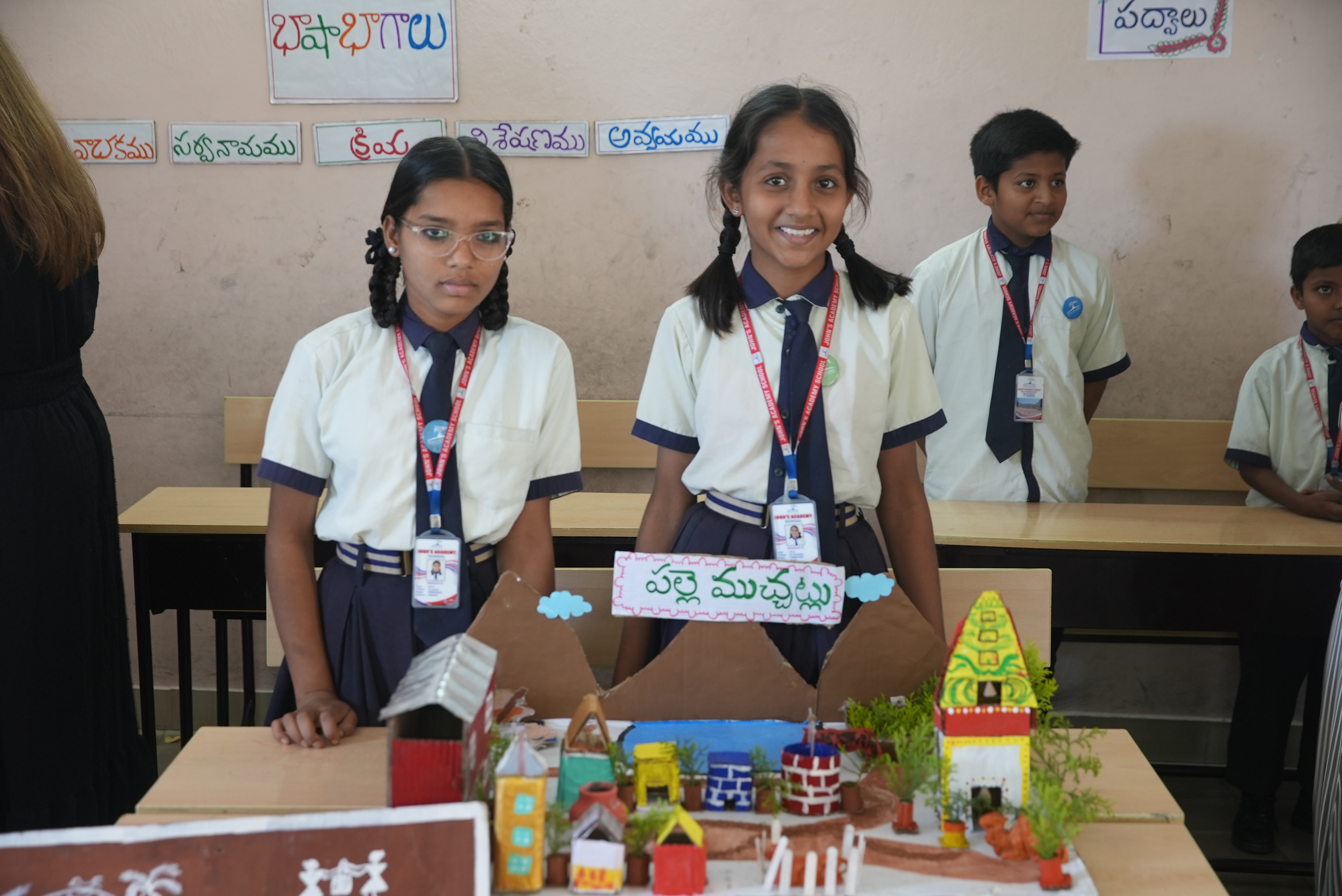 John's Academy students presenting a Telugu language project in class